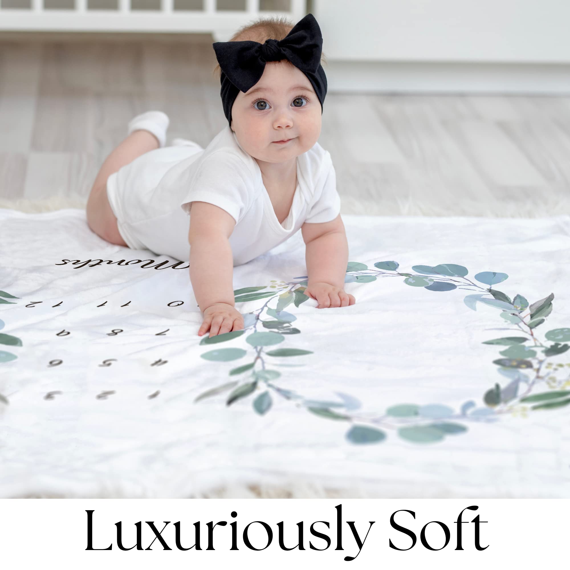KEMINA BLANKETS twins milestone blanket eucalyptus flat lay emphasizes dual milestones and cozy snuggle time