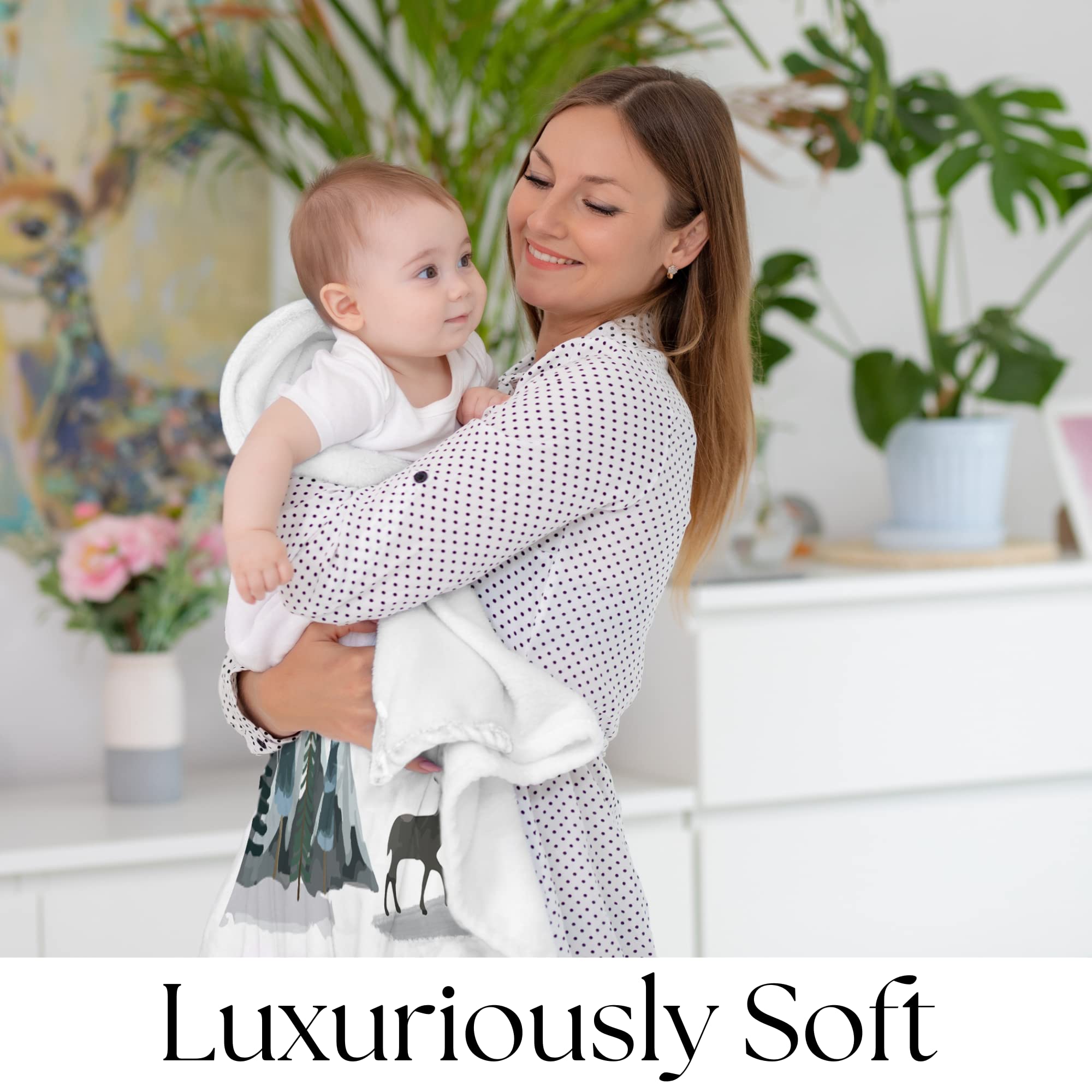 Kemina Blankets woodland theme blends with nursery decor for timeless photos