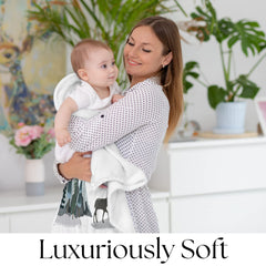 Kemina Blankets woodland theme blends with nursery decor for timeless photos
