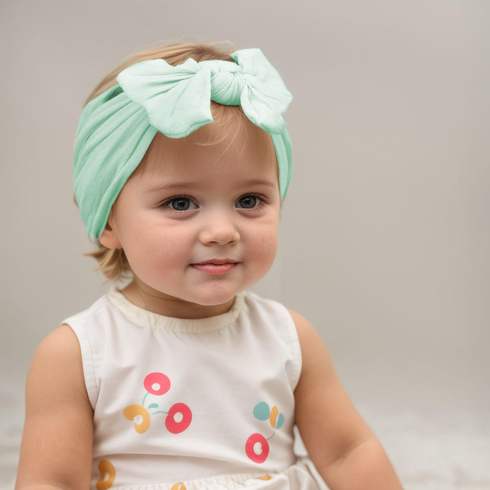 Kenjudess headband for daily wear, mint green, with secure, gentle fit.