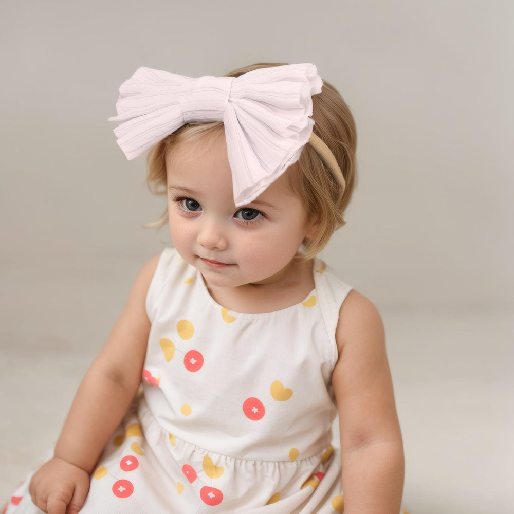 Kenjudess headband on baby outfit in pink, versatile color for outfits