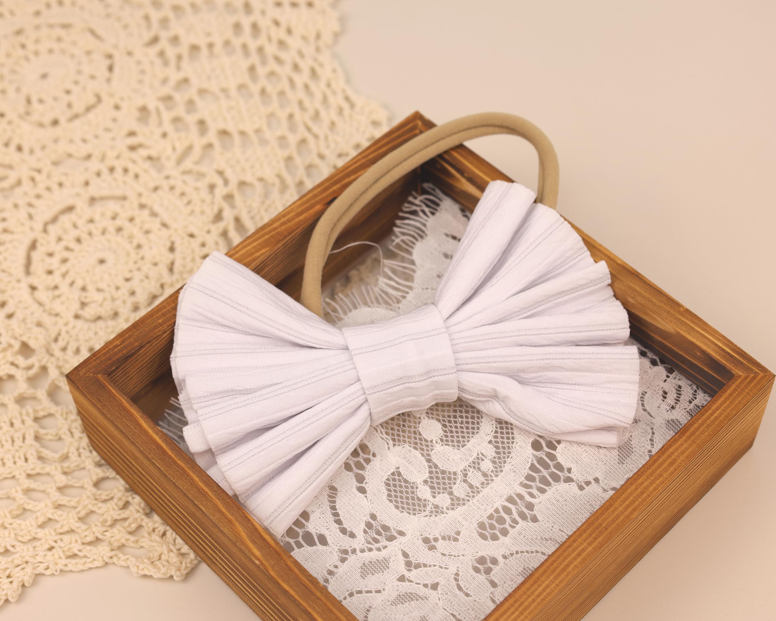 Kenjudess navy-blue headband with oversized bow making a cute gift idea
