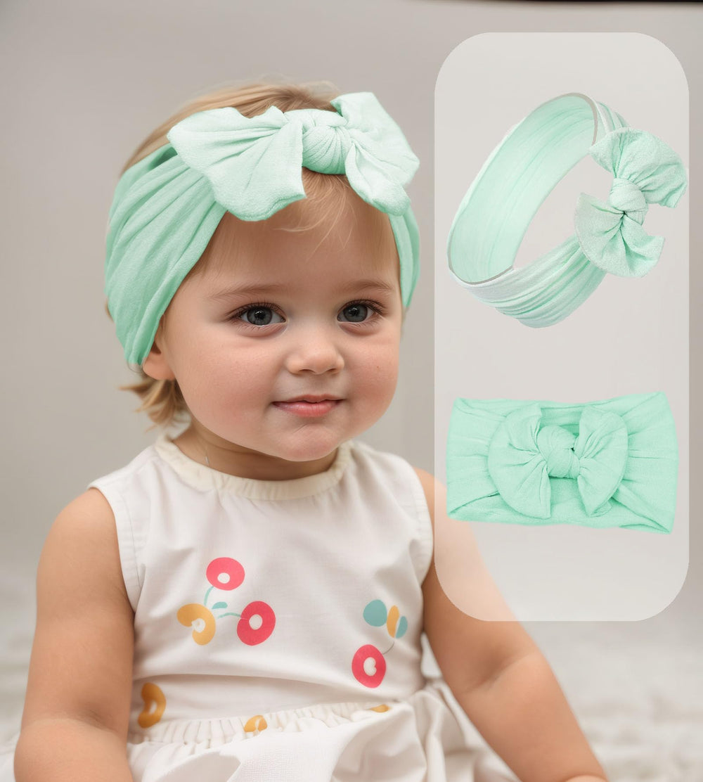 Kenjudess mint-green headband with large bow for newborns and toddlers.