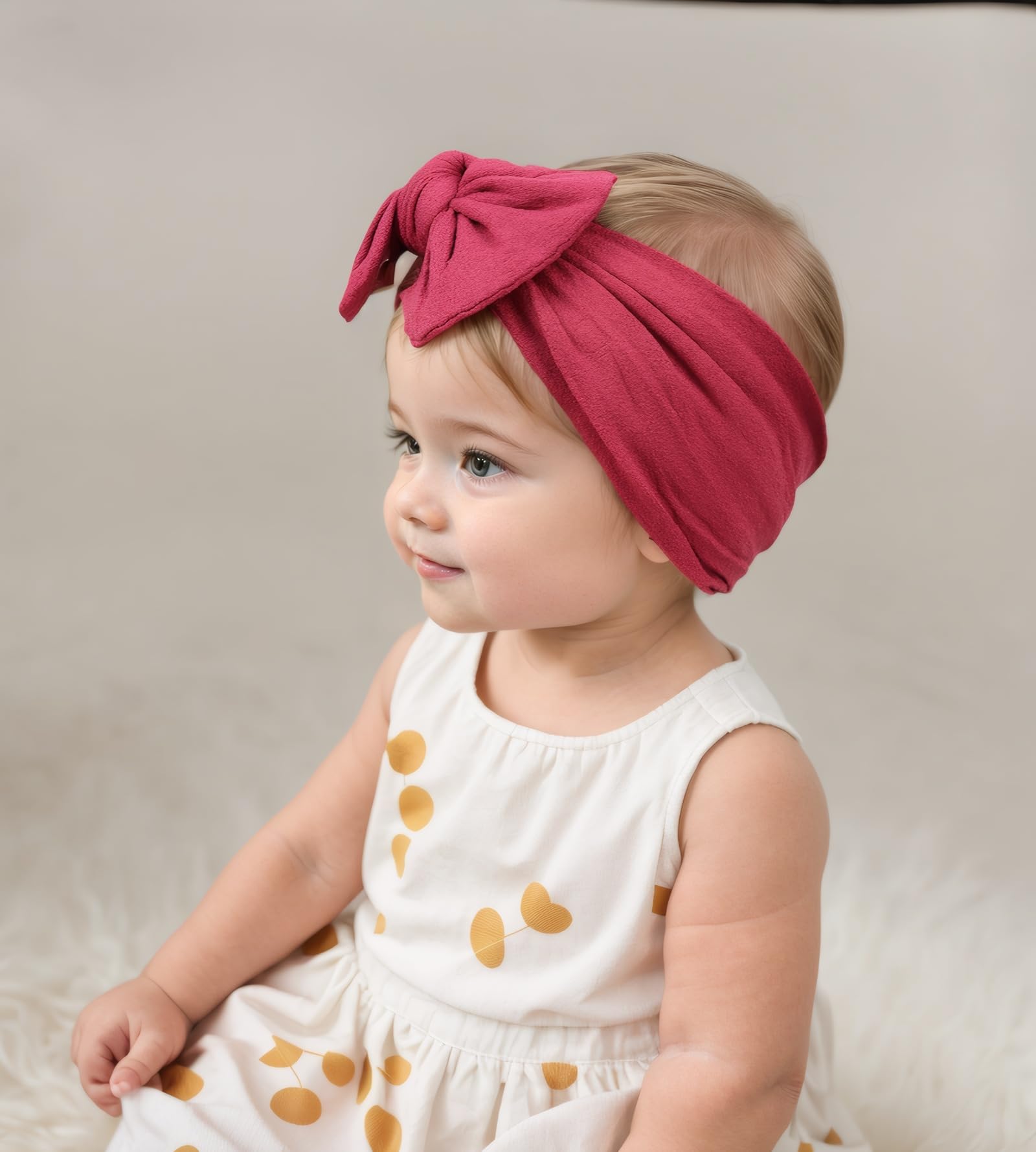Kenjudess wine-red headband on infant wear demonstrates easy, stylish styling.