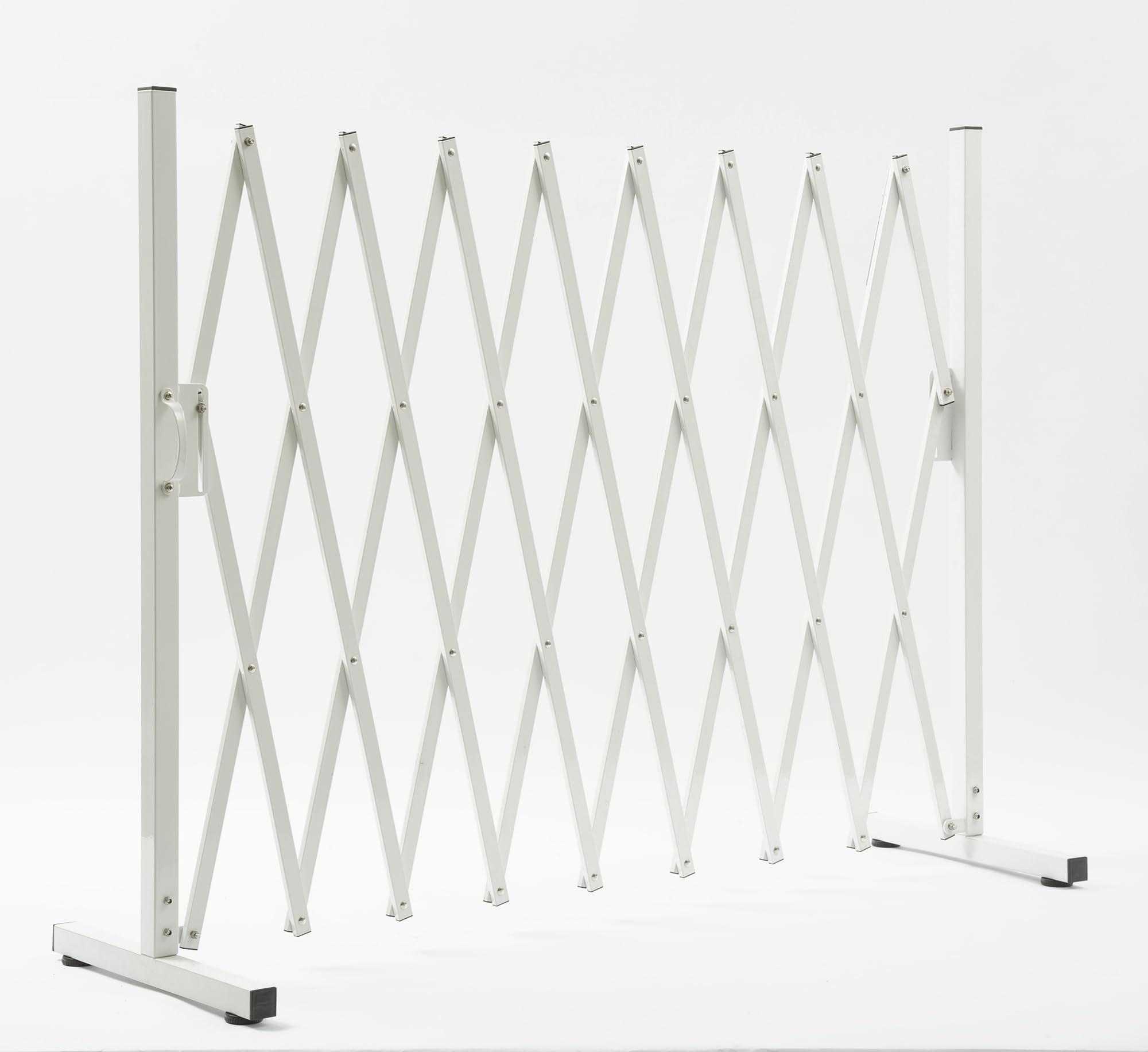 KENNISI metal expandable dog gate free-standing portable barrier in use.
