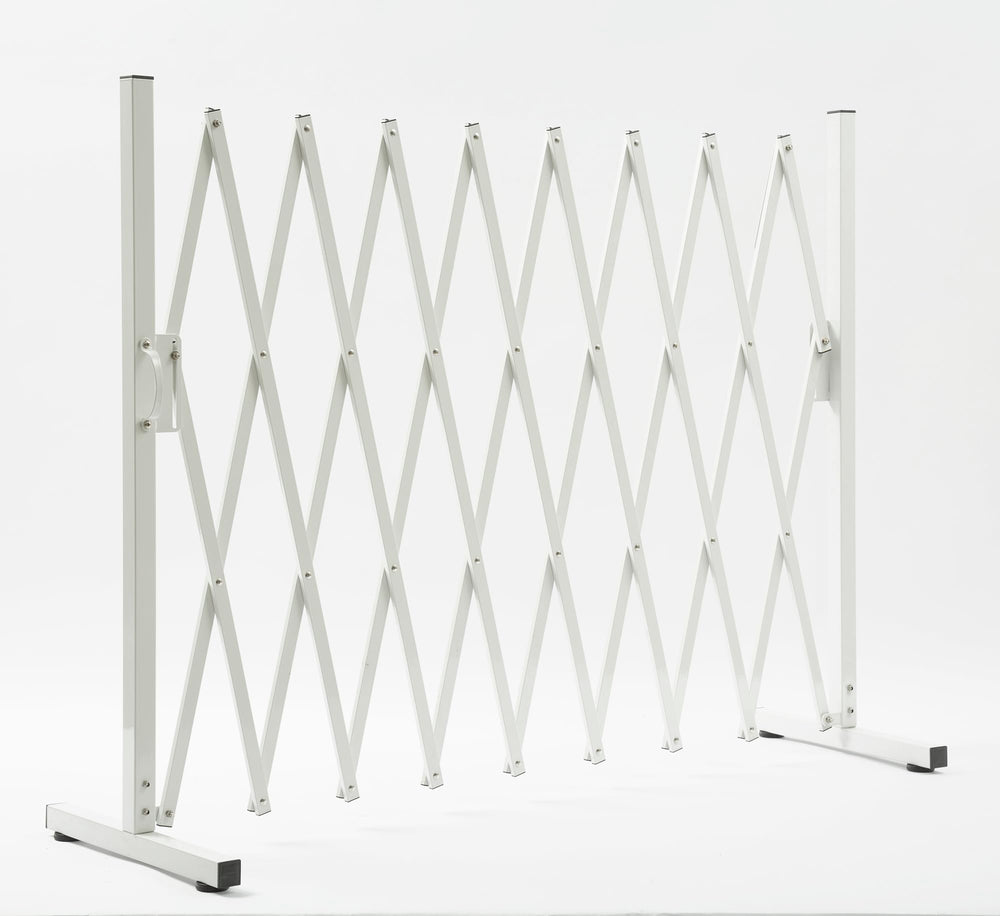 KENNISI metal expandable dog gate free-standing portable barrier in use.