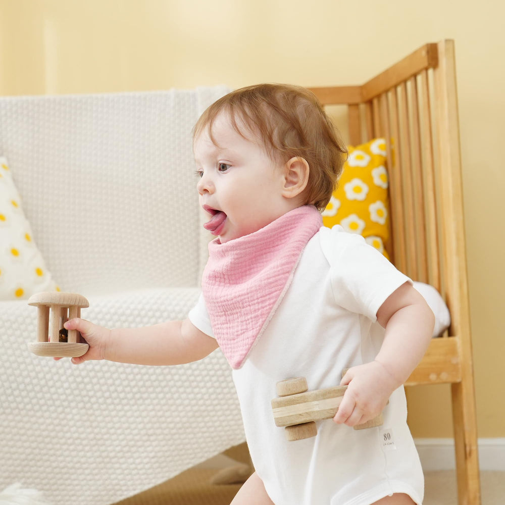 Kewlife Gift muslin baby bibs used on a baby wearing scenario for mess protection