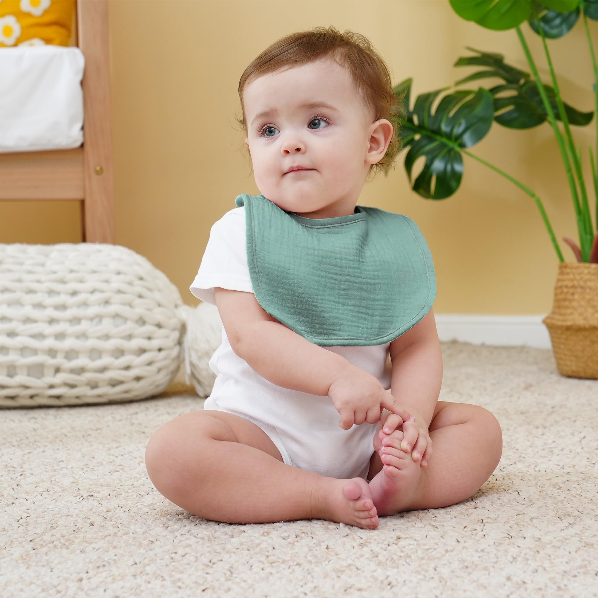 Kewlife Gift Muslin Baby Bibs worn with outfits for a cute look.