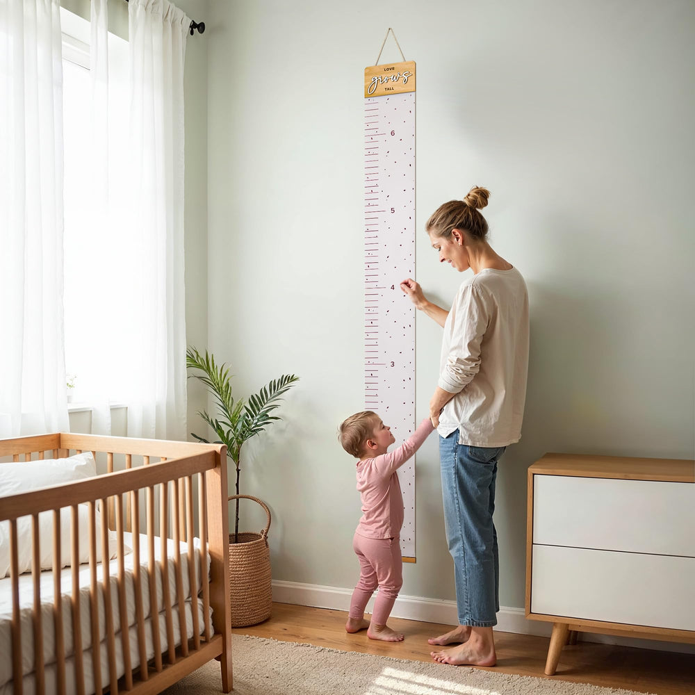 KIBAGA growth-chart-child-measuring depicts a child being measured for lasting milestones.