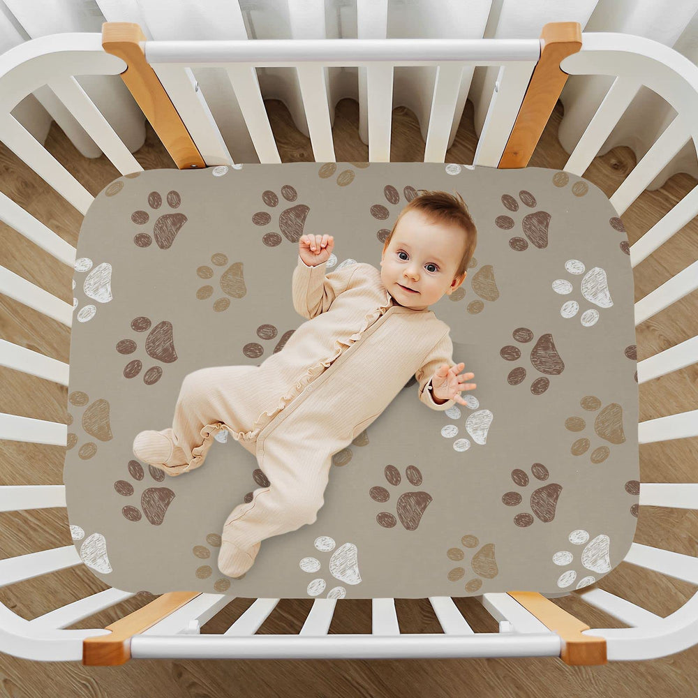 KICPOAY playard sheet on mattress featuring brown dog paws for cozy naps