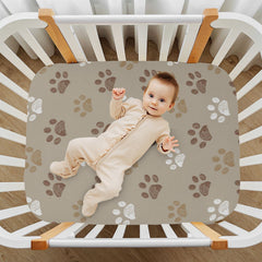 KICPOAY playard sheet on mattress featuring brown dog paws for cozy naps