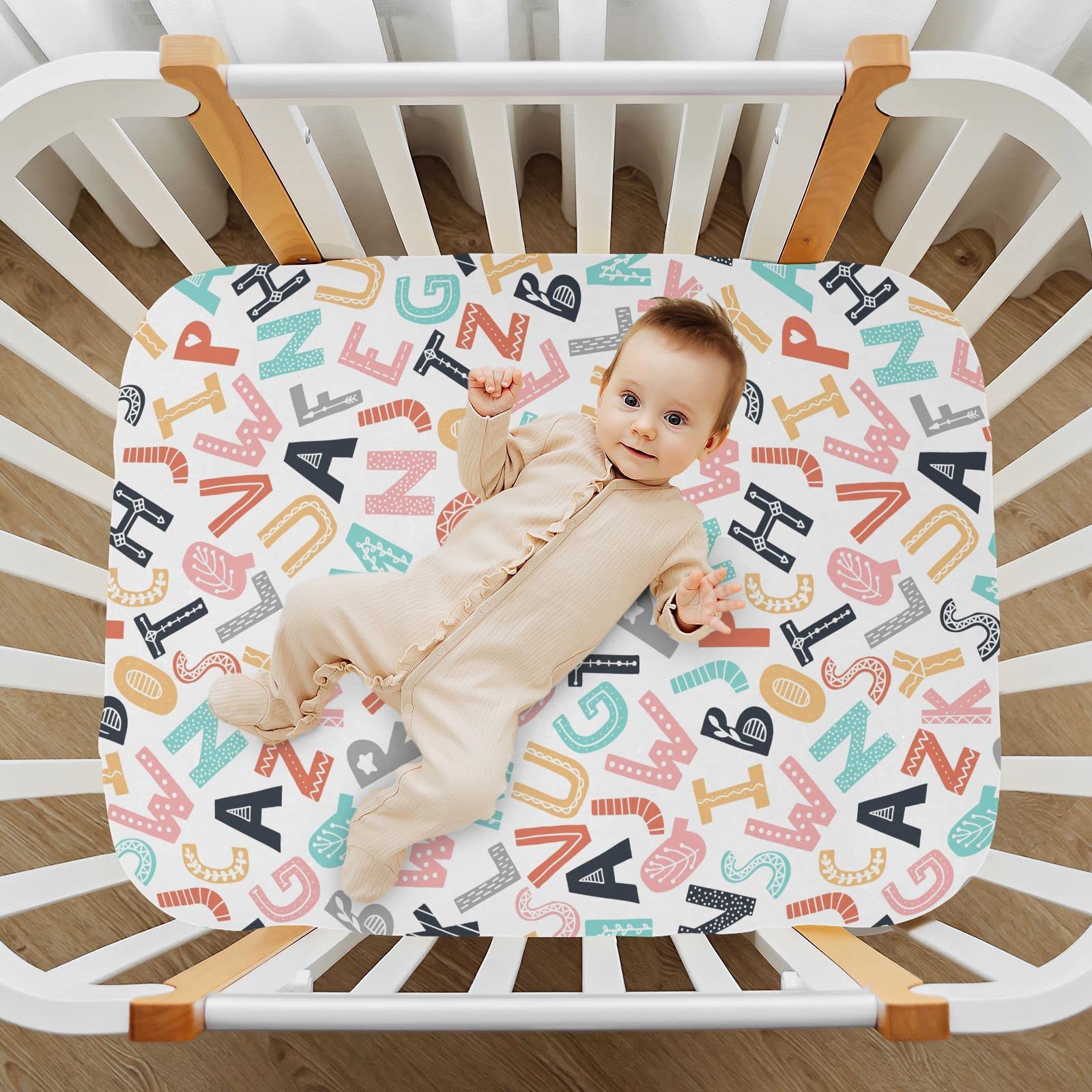 KICPOAY playard sheet fit 39x27x5in demonstrates snug coverage.