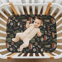 KICPOAY Vintage Mushroom Forest crib sheet flatlay highlighting cozy, breathable material.