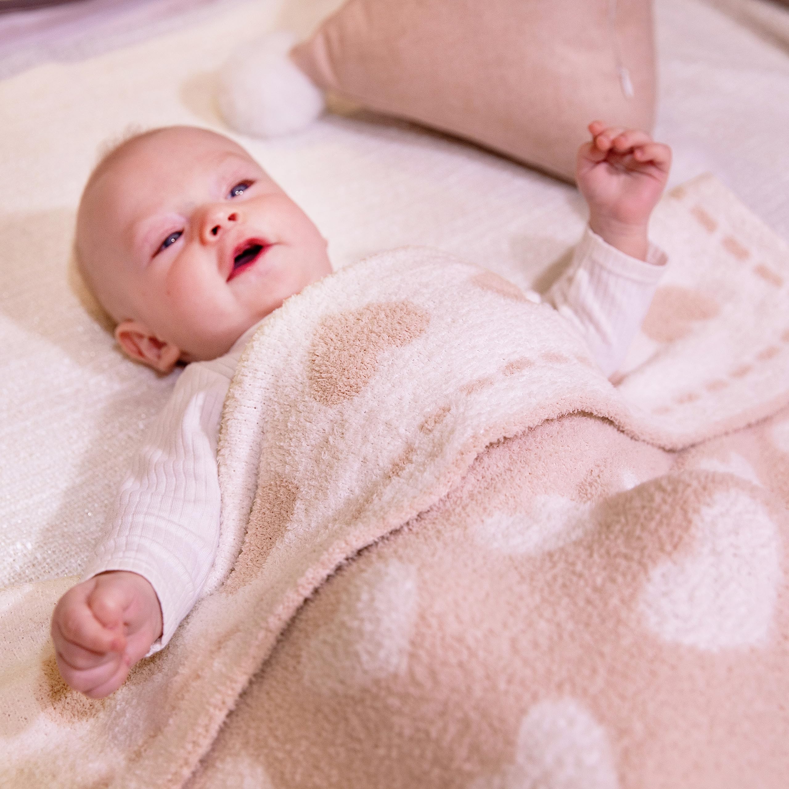 Kid Nation soft plush blanket close-up highlights cloudlike softness.