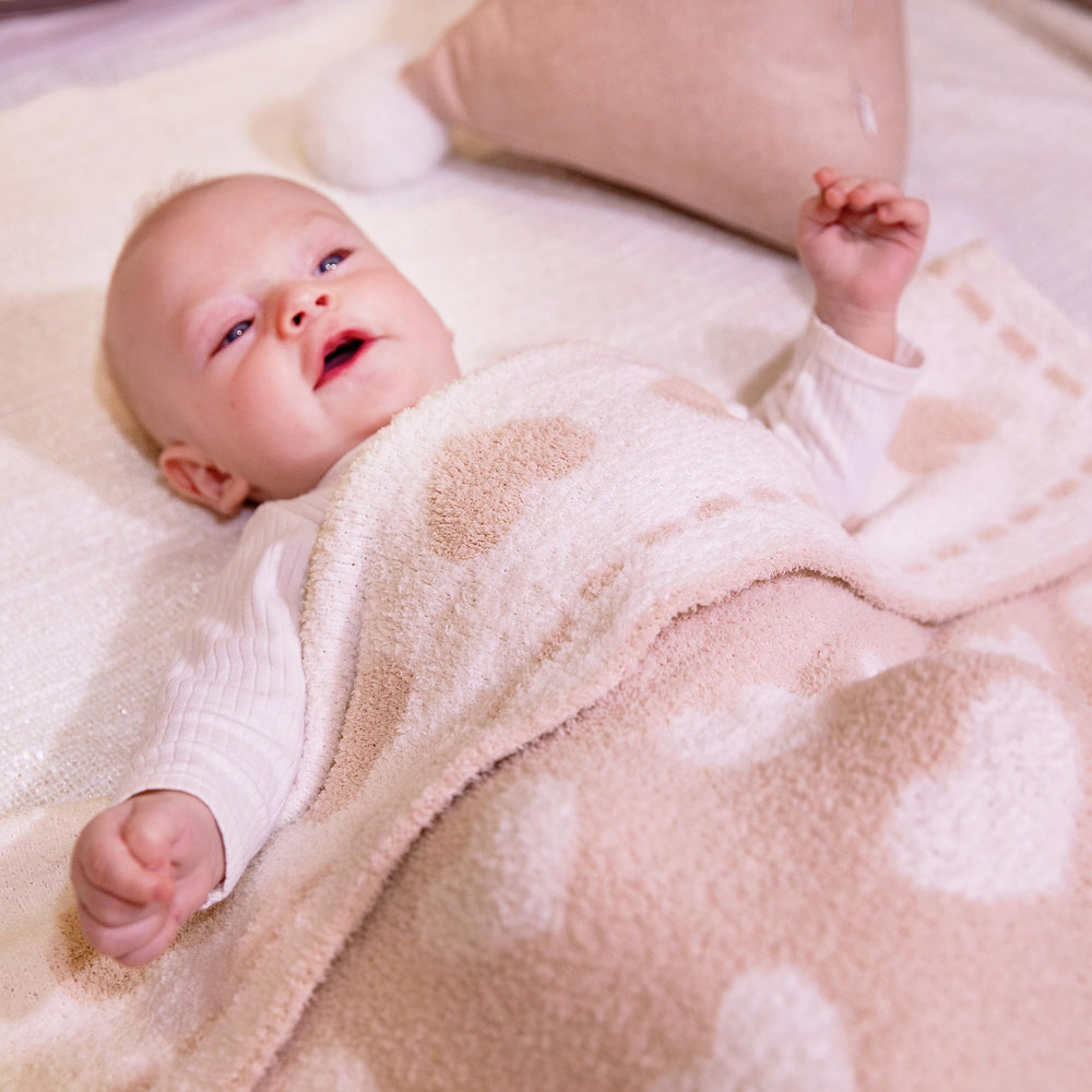 Kid Nation soft plush blanket close-up highlights cloudlike softness.