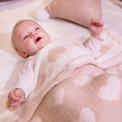 Kid Nation soft plush blanket close-up highlights cloudlike softness.