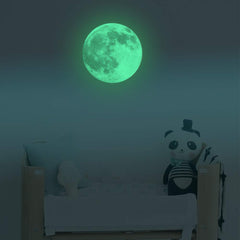 Kiddale glow-dark moon wall decal on ceiling for gentle nighttime glow.