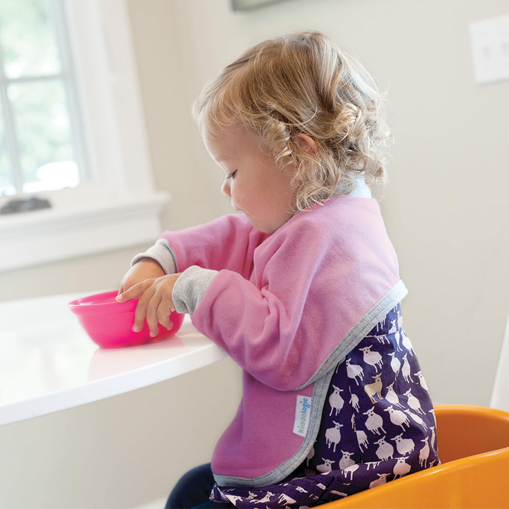 Kiddologic Bibit-all bib provides full lap coverage to reduce mess during meals.