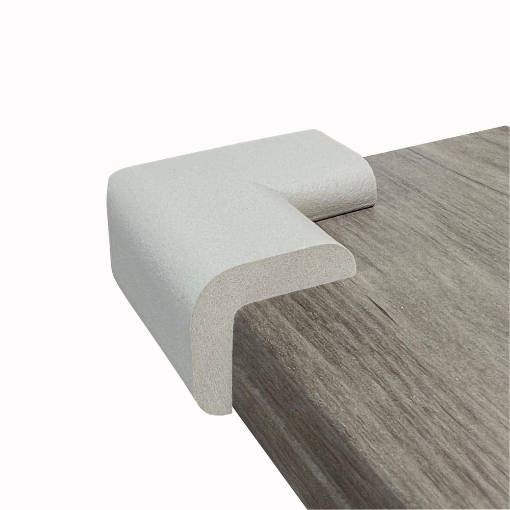 Baby-safe angles highlighted by KidKusion Corner Cushions on sharp furniture corners.