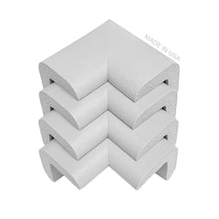 KidKusion soft gray corner cushion close-up demonstrates protective padding for furniture edges.
