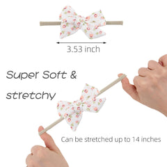 KIDOCHEESE Baby Bows stretchy elastic band demonstrates flexible, secure, no-slip fit.