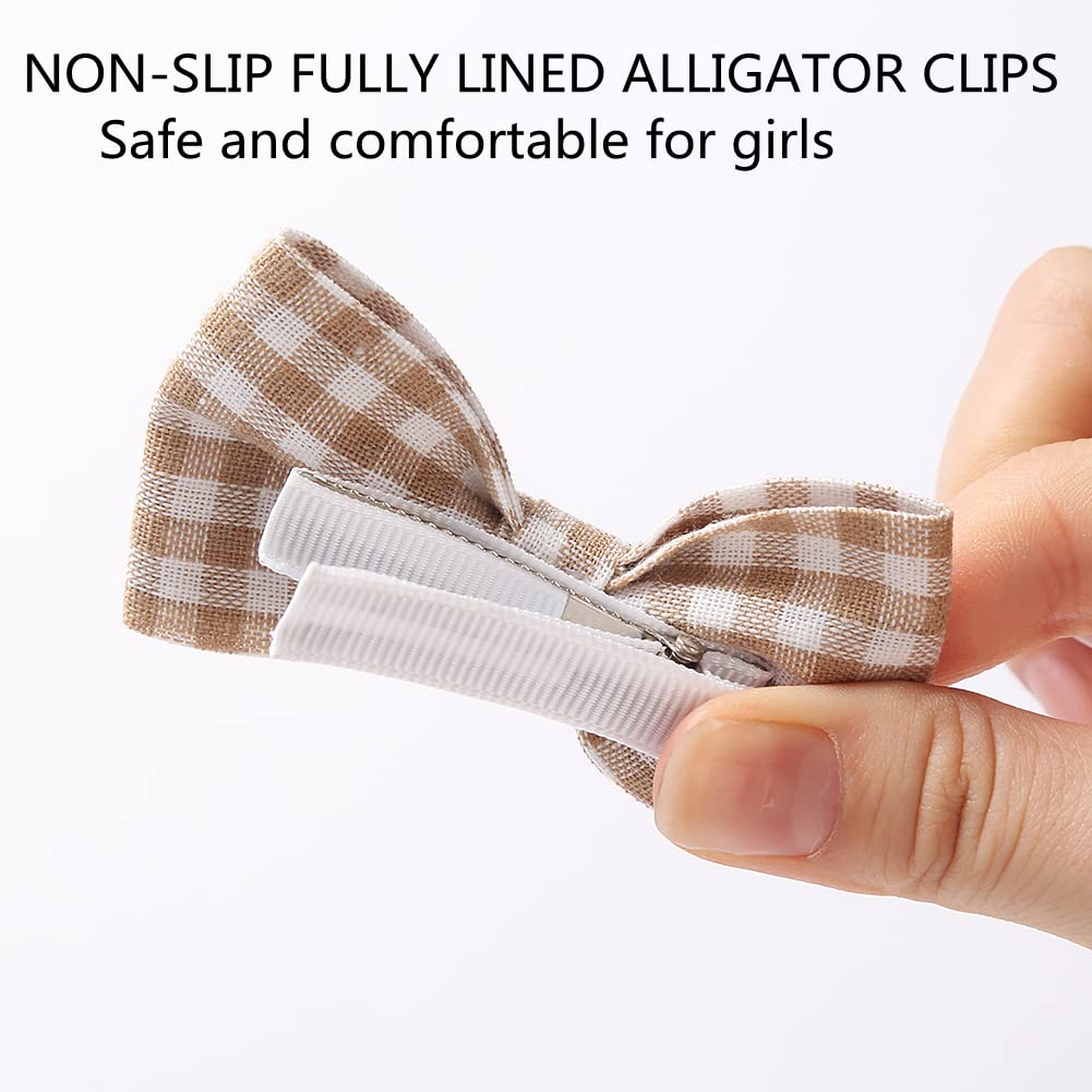 KIDOCHEESE baby hair clip in-use on coarse hair provides reliable lightweight hold.
