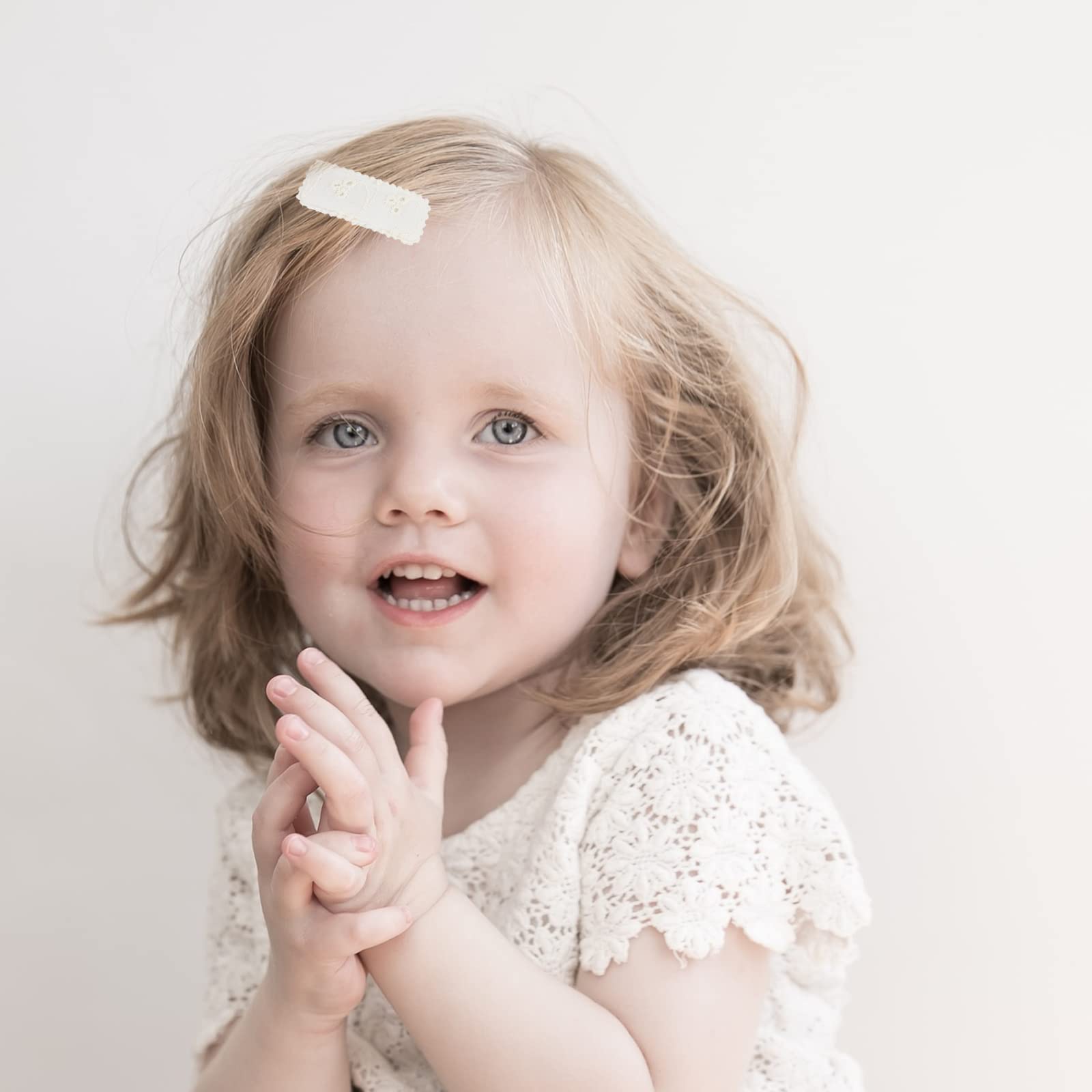 KIDOCHEESE flower-colored clips match outfits for photos and events.