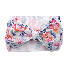KIDOCHEESE Big Bows close-up reveals soft fabric texture and non-slip feel.