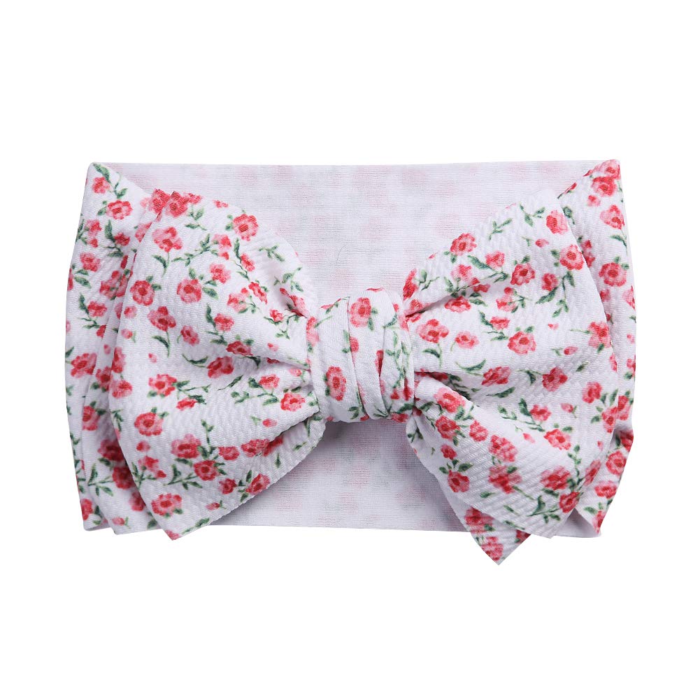 KIDOCHEESE big bows headband on a smiling baby showing comfortable elastic fit.