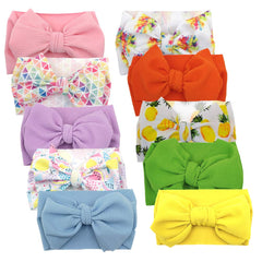 KIDOCHEESE big bows headband in pink color, soft elastic fit for newborns.