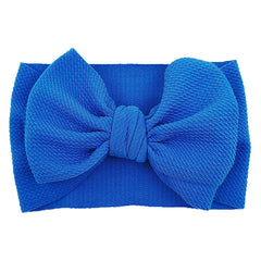 KIDOCHEESE big bows headband soft fabric keeps baby comfortable all day.