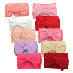 KIDOCHEESE big bows headband close-up shows soft material for newborn comfort.