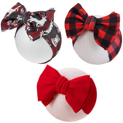 KIDOCHEESE Christmas baby bows front view; soft, adjustable headband for newborns.