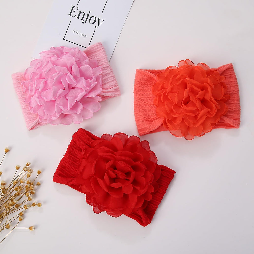 KIDOCHEESE flower headband elastic nylon band for flexible wear.