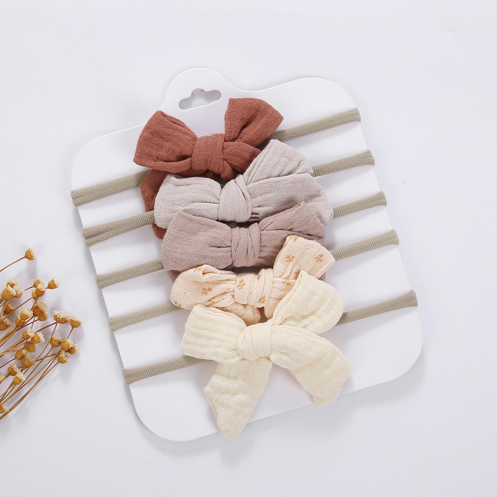 KIDOCHEESE gift-ready bows ideal for newborns and birthdays.