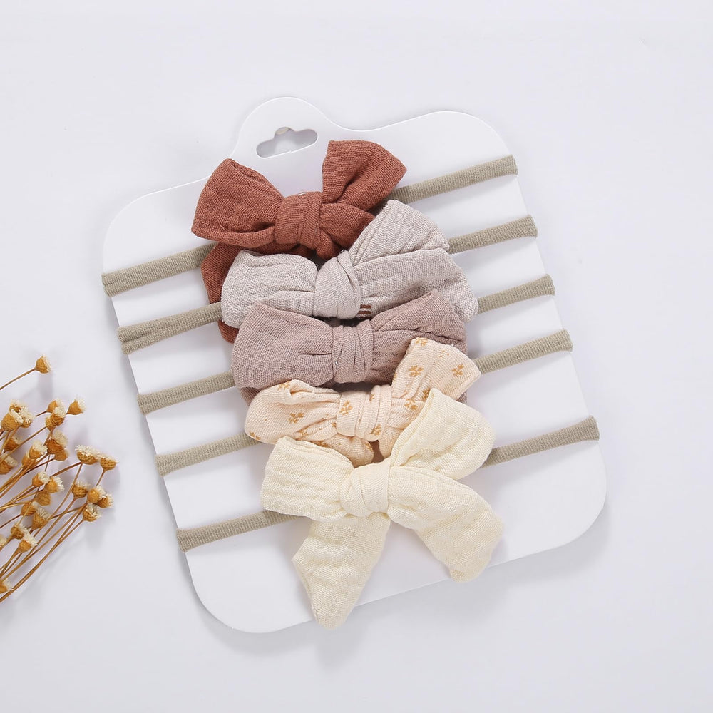 KIDOCHEESE gift-ready bows ideal for newborns and birthdays.