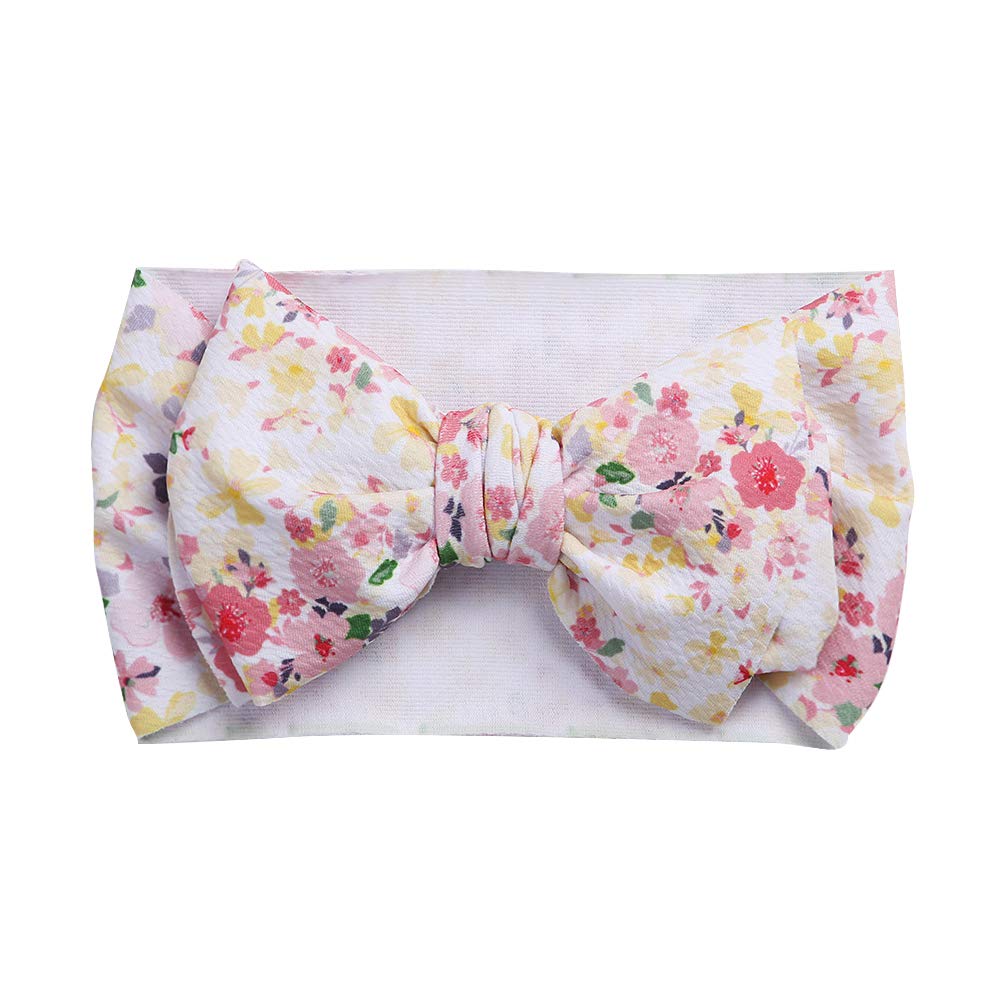 KIDOCHEESE headband elastic-band-fit demonstrated on toddler with a colorful bow.