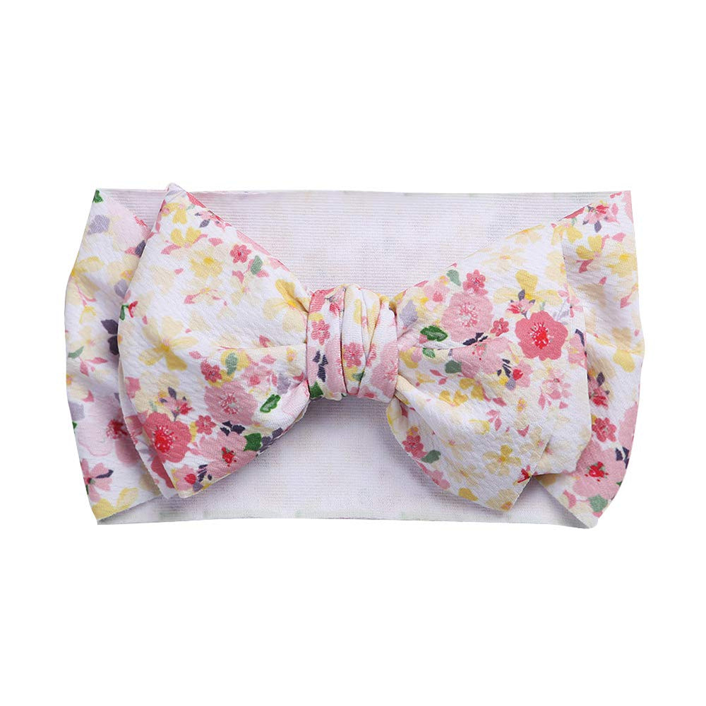 KIDOCHEESE headband elastic-band-fit demonstrated on toddler with a colorful bow.