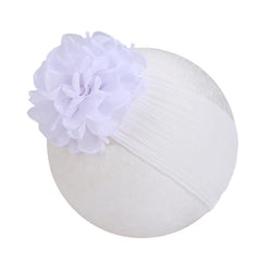 KIDOCHEESE nylon headband prevents compression marks on delicate skin.