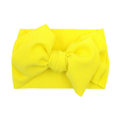 KIDOCHEESE big bow headband in red is ideal for photoshoots.