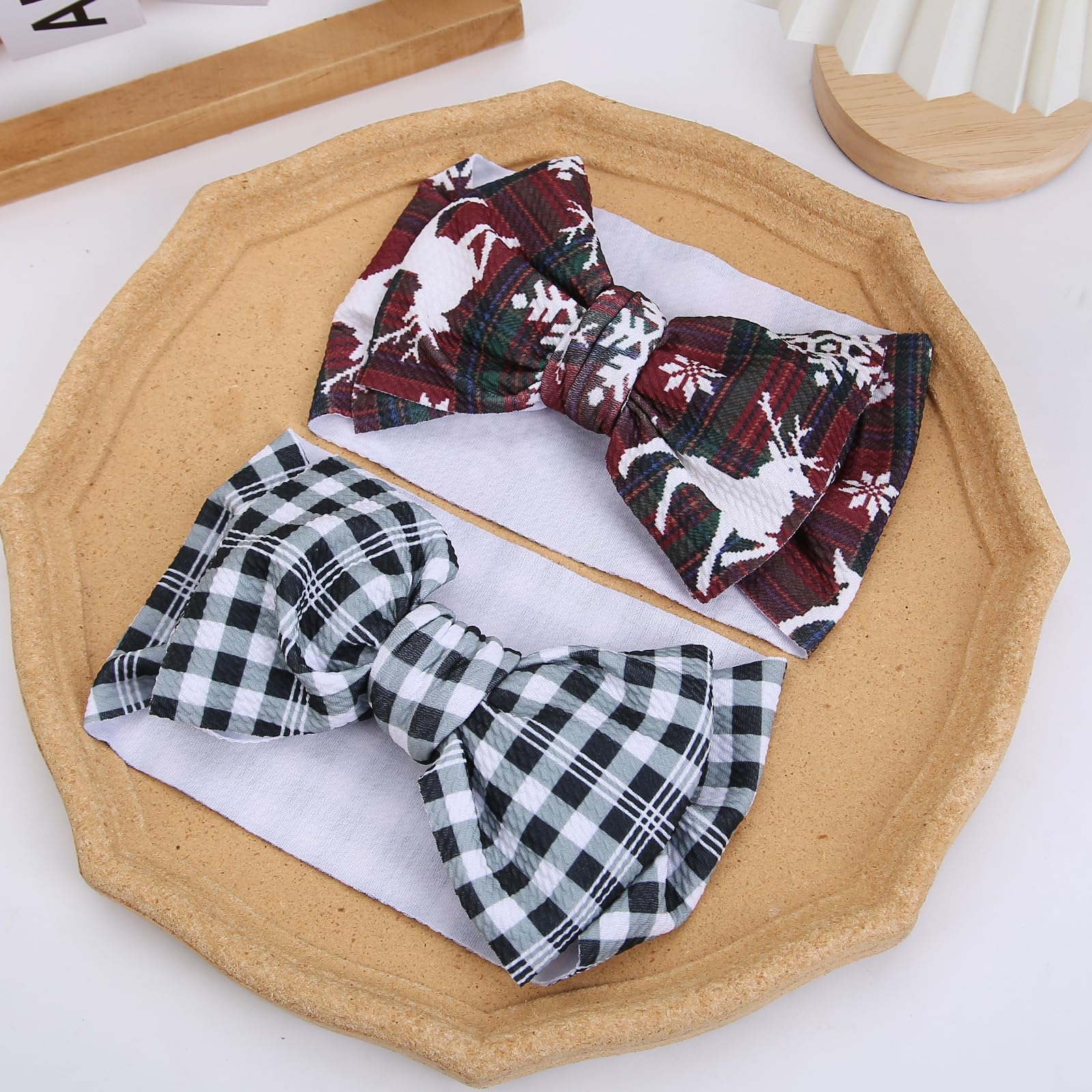 KIDOCHEESE oversized bows elevate baby ensembles at parties and gatherings.