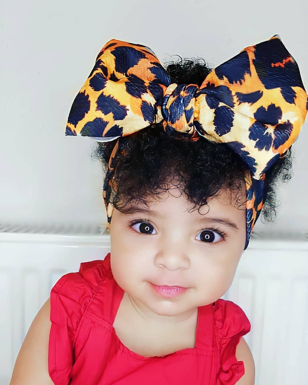 KIDOCHEESE oversized bow headband, soft fabric, comfy all-day wear.
