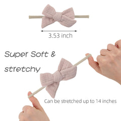 KIDOCHEESE stretchy nylon-band keeps bows secure without pinching.