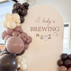 KIETKIE A Baby is Brewing wall decal shows coffee beans and baby accents for decor details
