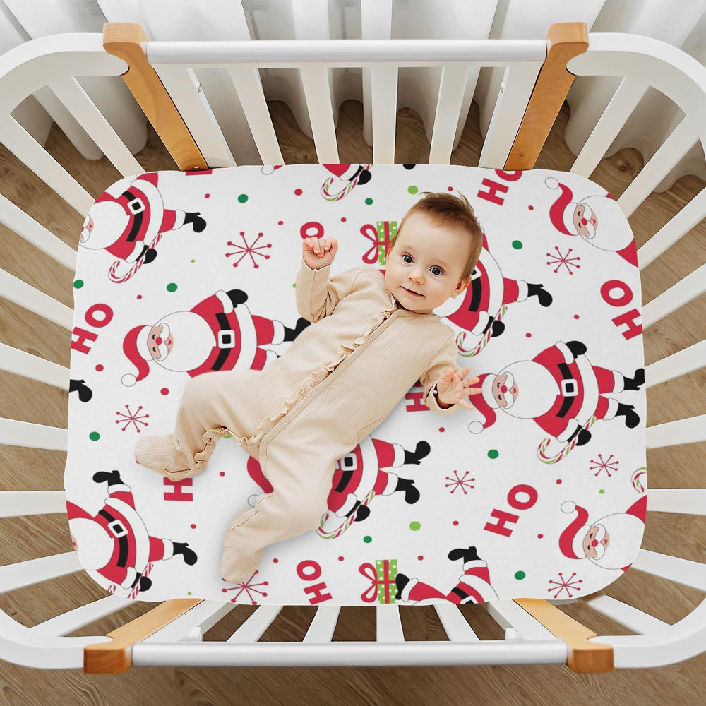 Kigai Santa crib sheet on crib from another angle for size perspective