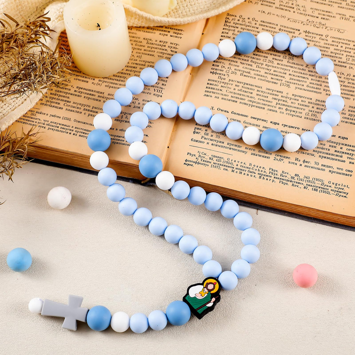 Kigeli cross baptism silicone rosary closeup of blue beads for gentle baby wear