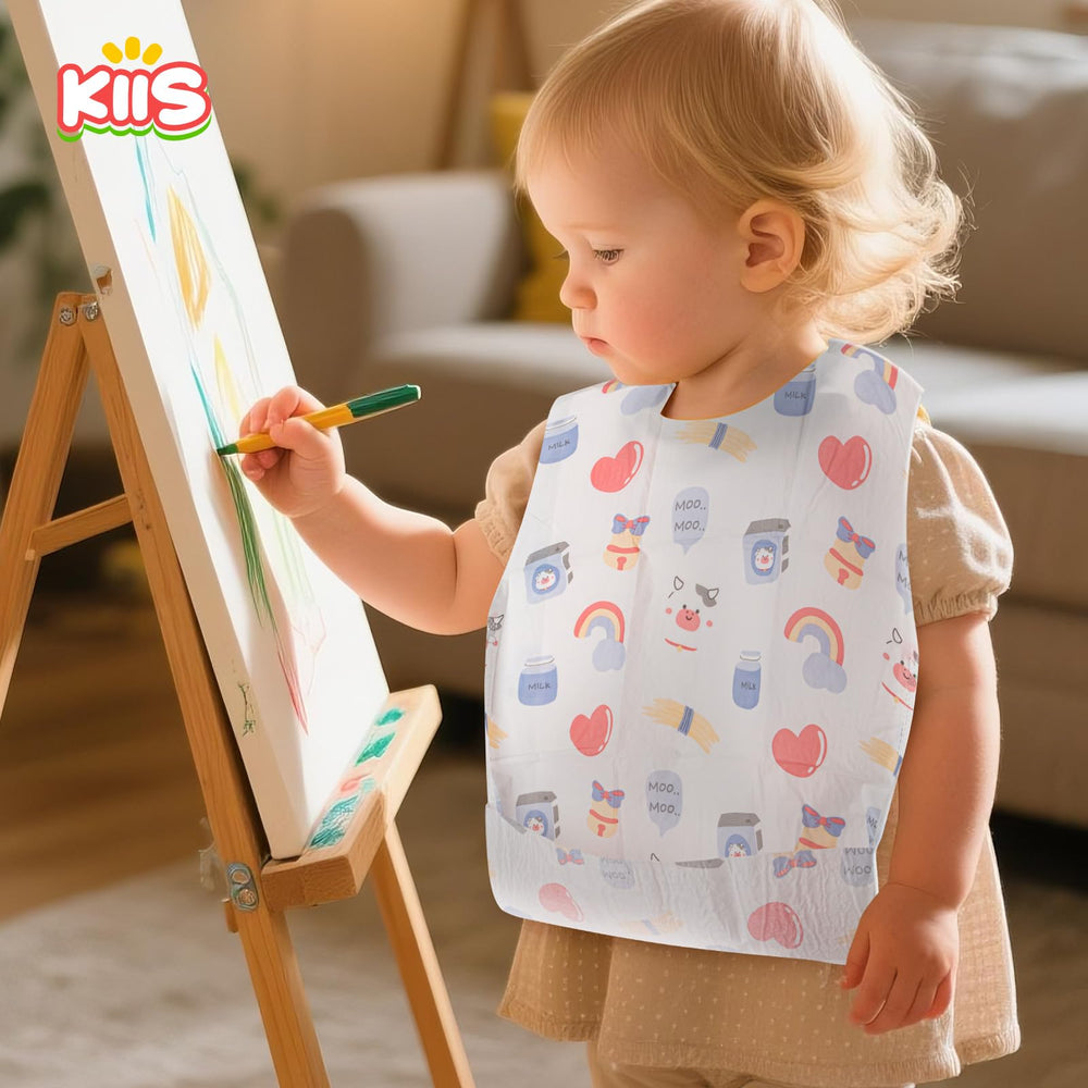 KIIS purple baby cow pattern bib adds playful protection at mealtimes