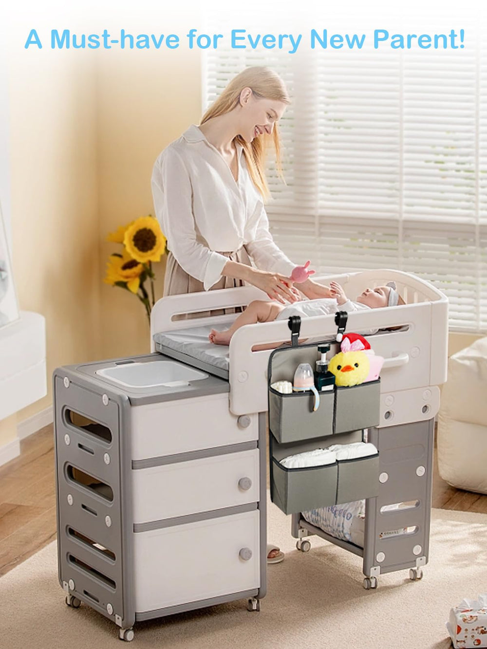 KIKJOK hanging-diaper-organizer-grey-nursery demonstrates compact storage beside crib.