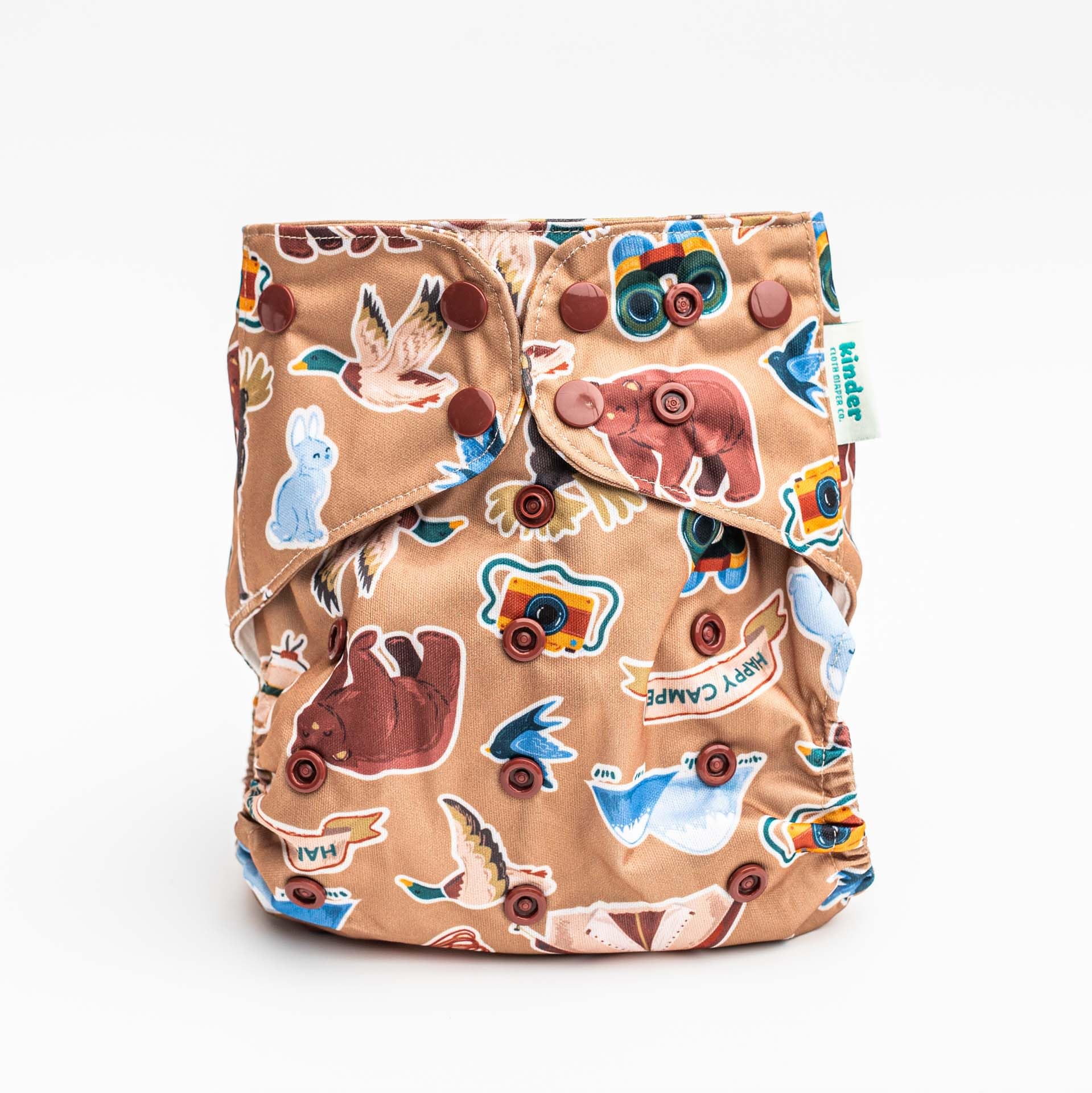 Kinder bear and floral prints add whimsy while secure snaps ensure proper fit.