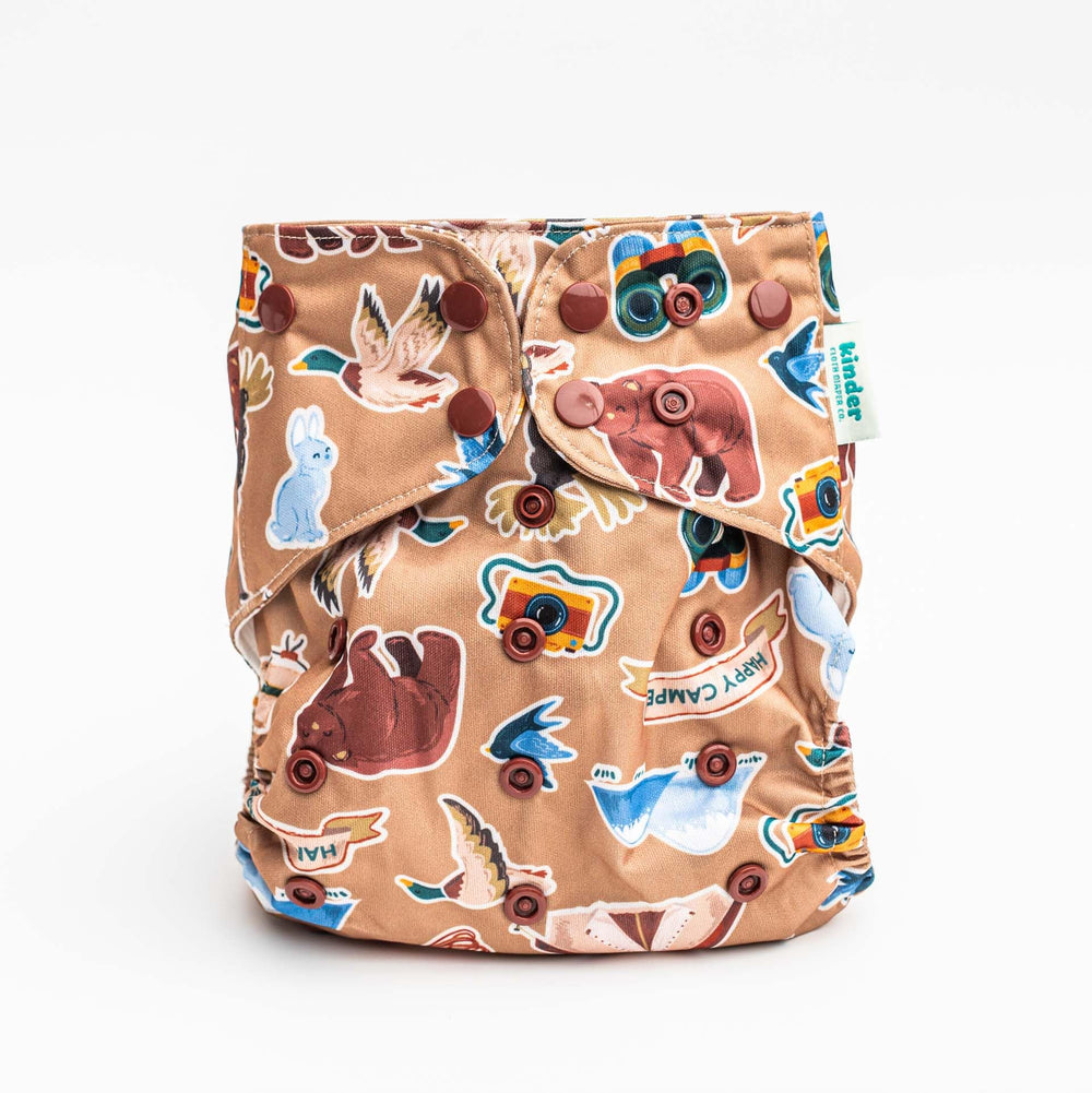 Kinder bear and floral prints add whimsy while secure snaps ensure proper fit.